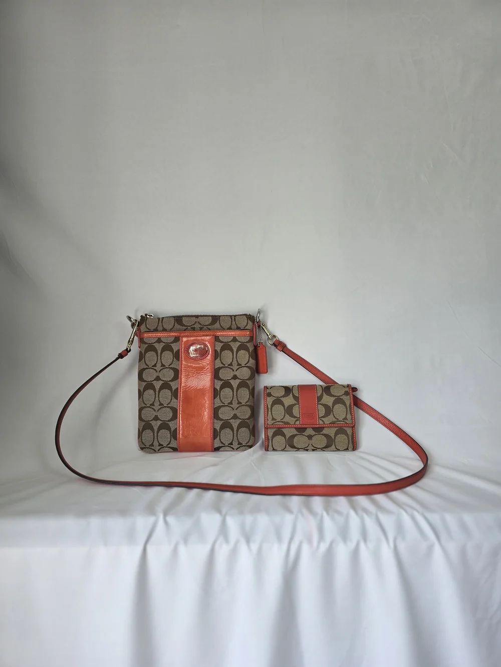 Coach Brown Signature Canvas Crossbody with Coral Trim and Matching Wallet